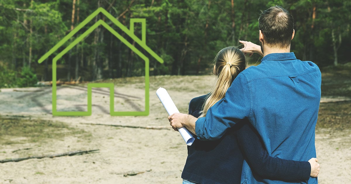 Young-couple-choose-a-plot-of-land-for-dream-house-construction-in-forest Young-couple-choose-a-plot-of-land-for-dream-house-construction-in-forest