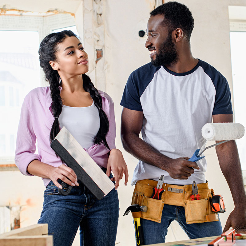 black couple working on home renovation
