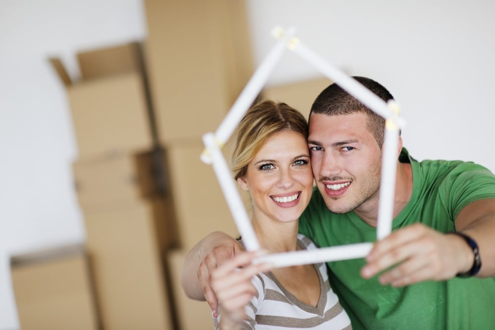 happy Young couple moving in new house