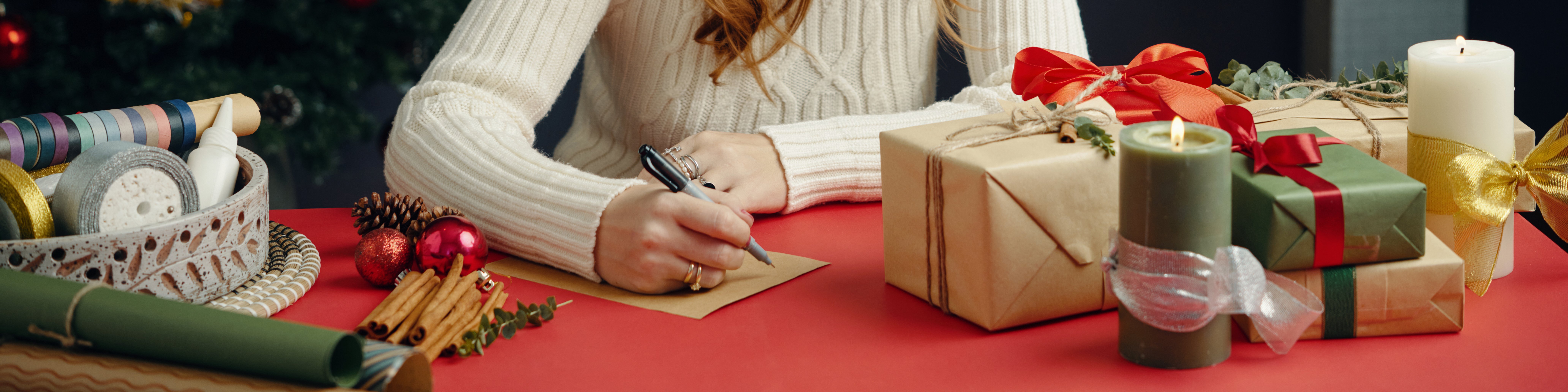 wrapping-holiday-gifts-with-festive-decorations-2024-10-22-01-01-16-utc