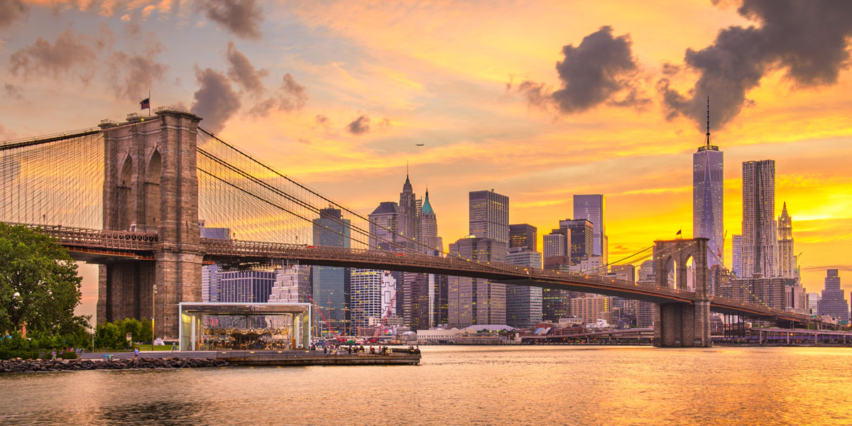 City scape of Brooklyn Bridge at sunset