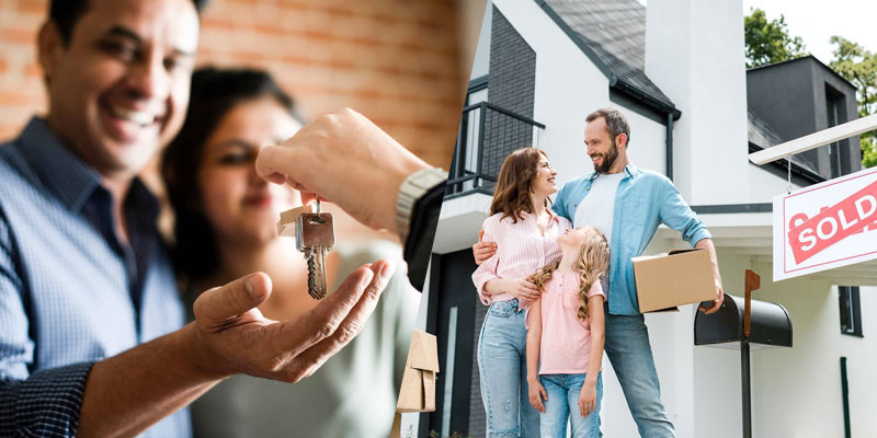 couple receiving keys to new home and family standing in front of sold house