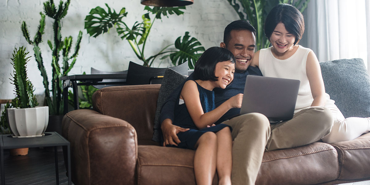 happy-family-on-couch-looking-for-homes