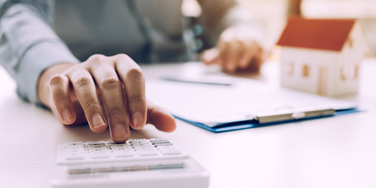 upclose of person using calculator