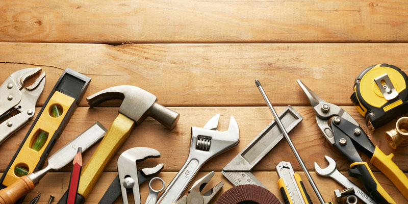 Tools laying on hardwood - overhead shot